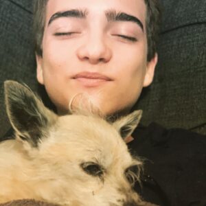Elias Harger Instagram - Snuggling with my old dog. Sadie is 16 years old. She still can’t drive though. Loser! 😂