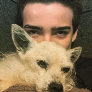 Elias Harger Instagram - Snuggling with my old dog. Sadie is 16 years old. She still can’t drive though. Loser! 😂