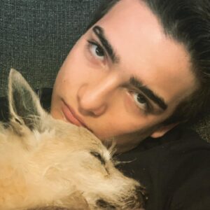 Elias Harger Instagram - Snuggling with my old dog. Sadie is 16 years old. She still can’t drive though. Loser! 😂