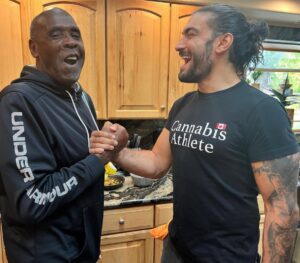 Elias Theodorou Instagram - Discount Romain Reigns with the WWE’s King Meat Sauce himself @realvirgil 💪🏾🍝 🥫#tagteam #kingofthering #waybackwednesday #meatsauce #drip