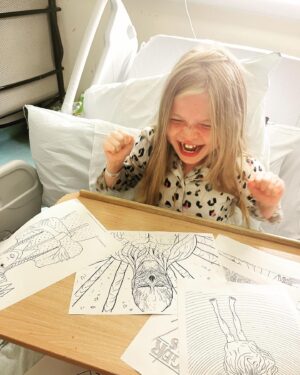 Ella Chadwick Instagram - When the playworker on the ward brings you stranger things and wednesday addams pics to keep you busy in hospital 😁❤️🖤 #hospital #strangerthings #wednesdayaddams #colouring