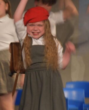 Ella Chadwick Instagram - Some photos from @tracingsteps #matilda show last week. I loved being red beret girl ❤️ 1st photo was taken by @nessworthyphoto @popsiclephotography and i love it thanks for capturing that pic❤️ and big thanks to those from the film matilda that took part in the special video message i suprised everybody with we shown it them just before the show and they all screamed and cheered 🎉🎉 #matilda #performance #middletonarena #musical #tracingsteps #tracingstepsshow  #redberetgirl