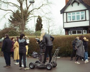 Ella Greenwood Instagram - Smudged Smile is now available to stream (for free) on @stream_klipist - I’m so proud of this wonderful film and so excited that it’s now available for a whole new audience to watch! Starring the very talented @mia_mbruce, the film was created as a way of introducing the topic of Mental Health to young people. This is such a special project, one of my first ever films, made when I was 19 years old with such an incredible cast and crew♥️ 
📷 by @ines_leila_hachou 

Smudged Smile - 
@candid_broads_prod @brokenflamespd 
Director  @popsella 
Writer @hannahrw1 
Producers @oriane_pick @anais.fto 
DOP @xeniaxpatricia 
1st AD @aynoaalvarez 
Production Designer @giorgia_joseph_art 
Hair & Make up @morganemakeup11
Costume @oliviarosehulme

Edited by @editor_emmalie
Grade @lizo_xanh_colourist
Sound design & Mix michalianna
Music @gabyamblercomposer

Casting by @frankie_fearis12

In loving memory of Art Assistant Marina Waldron