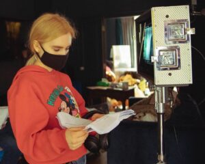 Ella Greenwood Instagram - Smudged Smile is now available to stream (for free) on @stream_klipist - I’m so proud of this wonderful film and so excited that it’s now available for a whole new audience to watch! Starring the very talented @mia_mbruce, the film was created as a way of introducing the topic of Mental Health to young people. This is such a special project, one of my first ever films, made when I was 19 years old with such an incredible cast and crew♥️ 
📷 by @ines_leila_hachou 

Smudged Smile - 
@candid_broads_prod @brokenflamespd 
Director  @popsella 
Writer @hannahrw1 
Producers @oriane_pick @anais.fto 
DOP @xeniaxpatricia 
1st AD @aynoaalvarez 
Production Designer @giorgia_joseph_art 
Hair & Make up @morganemakeup11
Costume @oliviarosehulme

Edited by @editor_emmalie
Grade @lizo_xanh_colourist
Sound design & Mix michalianna
Music @gabyamblercomposer

Casting by @frankie_fearis12

In loving memory of Art Assistant Marina Waldron