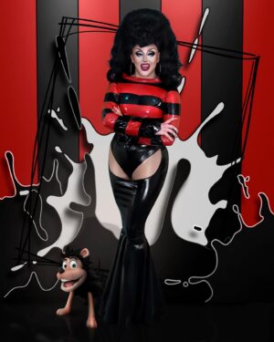 Ellie Diamond Instagram - ♥️🖤DENNIS FOREVER🖤❤️
-
Never in my 23 years would I have imagined that I’d be immortalised alongside Dundee history in my Dennis the menace look! It was an honour to reimagine this legendary Beano character as a 6”4 drag queen once again for the official opening. When creating the outfit for the show I wanted to keep all the traditional elements of Dennis but run the rest thru the Ellie diamond drag blender! I hope this piece being part of the gallery will show that Dundee has queer history and a powerful queer community that can make an impact outside of Dundee, no matter who you are! Achieving this really feels like my love letter to Dundee and all the challenges it threw at me. I may not have won a badge but this moment truly feels like a win, because who else has a wax figure of themselves? That’s history mawma! 💞
