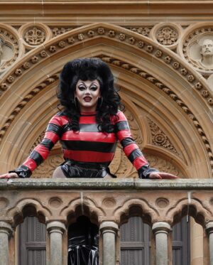 Ellie Diamond Instagram - ♥️🖤DENNIS FOREVER🖤❤️
-
Never in my 23 years would I have imagined that I’d be immortalised alongside Dundee history in my Dennis the menace look! It was an honour to reimagine this legendary Beano character as a 6”4 drag queen once again for the official opening. When creating the outfit for the show I wanted to keep all the traditional elements of Dennis but run the rest thru the Ellie diamond drag blender! I hope this piece being part of the gallery will show that Dundee has queer history and a powerful queer community that can make an impact outside of Dundee, no matter who you are! Achieving this really feels like my love letter to Dundee and all the challenges it threw at me. I may not have won a badge but this moment truly feels like a win, because who else has a wax figure of themselves? That’s history mawma! 💞