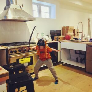 Emily Andras Instagram - New house update: reno definitely not done, but some of us more undeterred than others. Have a great weekend, love #DarthViking. 😄