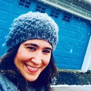 Emily Andras Instagram - Portrait of a woman in winter with her (very) blue garage.