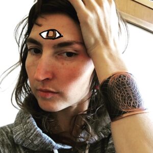 Emily Kokal Instagram - During @desertdaze_official this year I passed by Rachel and Adrian’s @houseoftenebris booth, drawn in by their wares and this ANJA Cuff - reminded me of my girl 
She-Ra, and other childhood heroines and heroes. 
They were so cool and let me borrow it for our show that night (Protected us from the storm ??)
When I went back to return it they kindly gave it to me :) Thanks again guys ! * I feel the power 🐀
(Anja is Hindu for the 3rd 👁 )