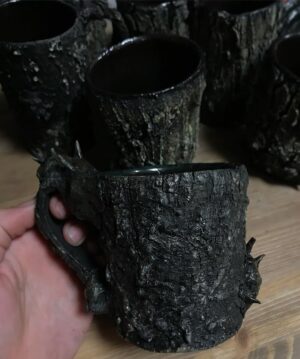Emily Serpico Instagram - 💀Adding luster to the rims of these last haunted forest mugs/cups before @monsterpaloozaofficial 💀 Stop by our booth to pick up one in person! #ceramicmugs #haunted #hauntedforest #pnw #ceramics #pottery #luster #glaze