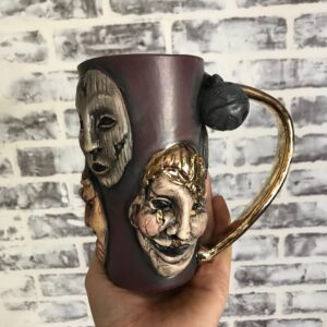 Emily Serpico Instagram - Finished Krampus mug! It has real gold overglaze, and is the only one ❄️ DM if interested #ceramics #overglaze #krampus