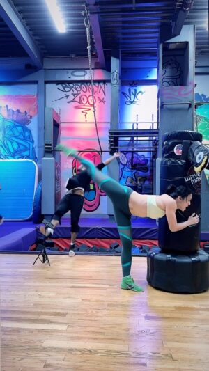 Emily Tung Instagram - Some will say this kick has no power 🤷🏻‍♀️🤭
I say it’s a double edge kick 😁 🗡 
.
.
.
.
#martialarts #martialartslife #martialartsgirls #scorpion #scorpionkick #badfriend #funnyvideos #stuntgirl #fighting #kungfugirl #kungfu #wushugirl #ninja #sneakattack #prank #stuntlife #stuntwoman #tkdgirl #taekwondo #taekwondotraining #heavybag #supergirl #training #workout #gym