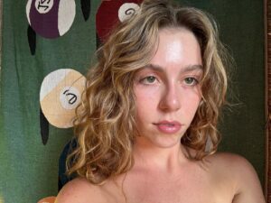 Emma Garner Instagram - Me in my room in Massachusetts on a warm day with a shirt on I promise