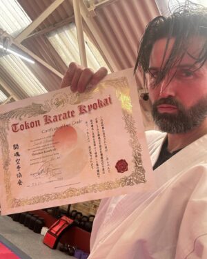 Emmett Scanlan Instagram - Today I got my black belt 🥋. 7 years of ripped muscles, torn ligaments & broken bones in the breaking, 7 years in the making.

To my brother, my sensei  @ant_pend thank you. It has been one of the true honours of my life applying Shotokan in the dojo & its spiritual guidance outside of it. 🇯🇵 

Gonna go ice myself…. a large tequila now.

OSU!! #ScaDan #Scansei