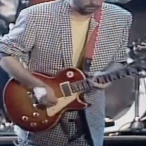 Eric Clapton Instagram - Eric performing “While My Guitar Gently Weeps” with George Harrison, Ringo Starr, and Mark King.