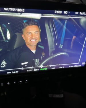Eric Winter Instagram - Out on these streets in the heat puttin in that pod car work! Little BTS on what it looks like to the real world. @therookieabc #streetsofla #bradford #patrol #therookie