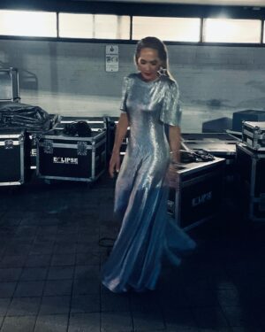 Erika Heynatz Instagram - Playing the part of Silver Bell for this weeks @beachescouncil Christmas Choral Concert in @luxedevalentina Fluted Como Maxi Dress | Silver Moonlight Shimmer