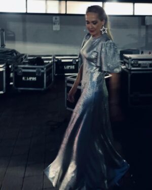 Erika Heynatz Instagram - Playing the part of Silver Bell for this weeks @beachescouncil Christmas Choral Concert in @luxedevalentina Fluted Como Maxi Dress | Silver Moonlight Shimmer