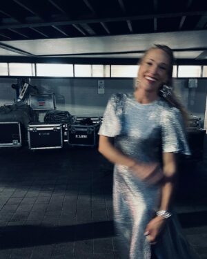 Erika Heynatz Instagram - Playing the part of Silver Bell for this weeks @beachescouncil Christmas Choral Concert in @luxedevalentina Fluted Como Maxi Dress | Silver Moonlight Shimmer