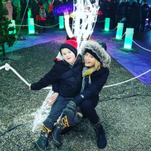 Estella Warren Instagram - With my adorable nephew at the winter fest. I am so happy to be back with my family. Merry Christmas and be safe.