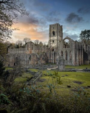 Evelyn Edwards Instagram - It’s true. I can’t deny it. Fountains Abbey is absolutely my favorite ruin I have ever been to. And I’ve been to A LOT. It’s possible that some unknown ruin I have yet to explore may steal my heart… but I kind of don’t think so. The detail that always boggles my mind about how Fountains Abbey became ruin is— when it was bought after the reformation the owner immediately started tearing it down to defray the cost of purchasing the land and buildings. I get it. It’s was expensive…. I just wished he hadn’t have started tearing it down. At least there is some left for us to wonder at. ⁣
.⁣
.⁣
.⁣
.⁣
#yourbritain #scenicbritain #england #ruins #abbey #photosofbritain #capturingbritain #gothicarchitecture #cathedral #churcharchitecture #historylovers #historicbuildings #medievalarchitecture #middleages #churchesofinstagram #historicchurch #medievalworld #architecturephotography #historicarchitecture #yorkshire #gothic #architectureporn #religiousarchitecture #churchesoftheworld #oldchurch #history #historicbuildings #historybuff