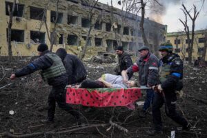 Evgeniy Maloletka Instagram - Air strike into the centre of Mariupol hit maternity hospital 3 and mass graves with dead bodies majority of them were killed by shelling. #mariupol #war #ukraine #russia #invasion