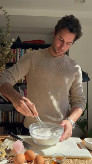 Franco Noriega Instagram - Levain cookies 🍪 

Ingredients:
- 227 grams of cold butter, cubed
- 1 cup of brown sugar
- 1/2 cup of white sugar
- 2 eggs
- 1 1/3 cups of cake flour
- 4 tb spoons of corn starch 
- 1 1/2 cups of all-purpose flour
- 1 teaspoon of baking soda
- 1/2 teaspoon of salt
- 1 1/2 cups of semi-sweet chocolate chips
- 1/2 cup of finely chopped semi-sweet chocolate
- 2 cups of chopped pecans or your favorite nuts 

Procedure:
1. Toast the nuts in a pan or bake them at 180 degrees Celsius for 5 minutes. Then chop them.
2. Add the cold butter to the mixer with the paddle attachment, along with brown sugar and white sugar, cream together for 4 minutes.
3. Add the eggs one by one, waiting for each to incorporate before adding the next. Beat at medium speed.
4. Reduce the mixer speed and gradually add both flours, as well as baking soda, salt, and the extra teaspoon of cornstarch.
5. Add the chopped chocolate, chocolate chips, and pistachios to the mixer. Mix at low speed for a few seconds only until incorporated.
6. Form 8 large dough balls. Each one weighs 170 grams. Do not shape them too much; the idea is for them to look bulky 
7. Place them on a baking sheet and refrigerate for 30min - 1 hour
Once ready to bake: preheat the oven to 400F. If you don’t have a large baking sheet, do it in batches. These cookies DO NOT spread, but they should have space between them. Bake for 12 minutes. The outside should look golden but still slightly soft inside. Let them rest for 10 minutes. The cookie should settle. They remain crispy on the outside but gooey on the inside. If you don’t like them gooey, bake for 20 minutes at 375F