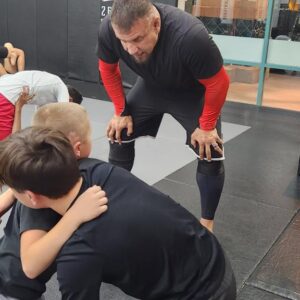 Frank Mir Instagram - As a competitor, you learn about yourself as a teacher you learn about your art. Priceless moments teaching one of my students Cash and my son.