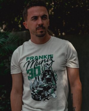 Frankie Muniz Instagram - Just a picture of Frankie Muniz wearing a Frankie Muniz shirt. My brand-new badass shirts are finally in! The first run sold out super fast but we will be printing ONE FINAL batch of them, so be sure to pre-order yours on MunizRacing.com. We will not be printing these again after this! Your support of my journey to be the best NASCAR driver means the world to me. Let’s get the W this weekend!