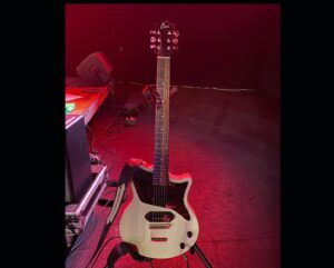 Fred Armisen Instagram - I’ve been having to fly to some shows on this tour, and @ciariguitars has been making it all so much easier to do. @theangieswan told me about these foldable guitars. They really do sound great. Btw, the company didn’t ask me to do this. I bought the guitar and I am so glad I did. It folds, with strings on, by pulling a lever at the back. Really easy to use, and it basically stays in tune after unfolding it. I also like how it looks! 
Photo credit from Anchorage: @taskertasker
