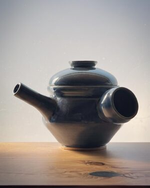 Freddie Wong Instagram - I decided last year when I started to have one shot at a teapot every March as a sort of “test” of my skill progression. This is the latest (lid mad loose, had to pull a handle due to my sense of proportion for a hump thrown handle being way off). Second picture is of my first teapot test. Definitely improving, but gotta keep going!