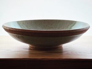 Freddie Wong Instagram - A pretty good bowl from the last kiln. The angles and cuts (especially an undercut on the foot) makes this particularly satisfying to hold in one hand.