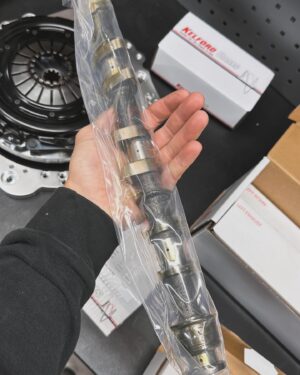 Fredric Aasbø Instagram - Aaand here’s the engine for the AE86 Corolla: A #TeamToyota 3UZ Lexus V8 on ITBs!

Some of of you guessed the motor when I first posted about the car - well done! These photos are of a first mockup and the plans are as follows:

- @kelfordcams (medium spec for good torque, factory pistons and retaining VVTi, 264 or 272 degrees duration)
- @mywireshop ultra nice custom race harness for MaxxECU, with new double TPS connectors, OBD-port, etc.
- @pmcmotorsport adapter kit and flywheel for ZF transmission
- @tenacimotorsport 240mm clutch and sprung disc for great driveability and reliability
- @xat_racing S65 ITB adapters
- Custom press fit ITB velocity stacks from my Uruguayan friend @fernandomontero_oficial
- Underdrive powersteering and alternator setup using parts from UZ mastermind @hughesracebuilt 
- @eneosusa Street 0W-50 motor oil, which is also what we run in Formula Drift

The engine itself was sourced by my friends at @garage_d_official and it’ll be fully built by my friend @dag_johnson using OEM parts from @toyota_norge. @maxxecu tuning by @jonusracing and fab work by @vtssolutions. Really excited for this build!