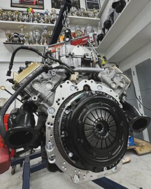 Fredric Aasbø Instagram - Aaand here’s the engine for the AE86 Corolla: A #TeamToyota 3UZ Lexus V8 on ITBs!

Some of of you guessed the motor when I first posted about the car - well done! These photos are of a first mockup and the plans are as follows:

- @kelfordcams (medium spec for good torque, factory pistons and retaining VVTi, 264 or 272 degrees duration)
- @mywireshop ultra nice custom race harness for MaxxECU, with new double TPS connectors, OBD-port, etc.
- @pmcmotorsport adapter kit and flywheel for ZF transmission
- @tenacimotorsport 240mm clutch and sprung disc for great driveability and reliability
- @xat_racing S65 ITB adapters
- Custom press fit ITB velocity stacks from my Uruguayan friend @fernandomontero_oficial
- Underdrive powersteering and alternator setup using parts from UZ mastermind @hughesracebuilt 
- @eneosusa Street 0W-50 motor oil, which is also what we run in Formula Drift

The engine itself was sourced by my friends at @garage_d_official and it’ll be fully built by my friend @dag_johnson using OEM parts from @toyota_norge. @maxxecu tuning by @jonusracing and fab work by @vtssolutions. Really excited for this build!