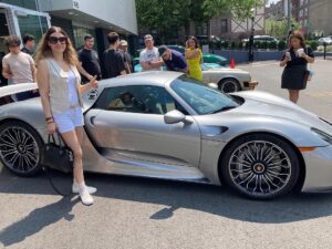 Genoveva Rossi Instagram - Porsche memories! With a $1.2 million  Porsche Spyder 918 at 75th Anniversary Event at Porsche Englewood. A fabulous event and such an honor to attend. Porsche has always stood for high-performance luxury sports cars 
🔥🔥🔥
God is great! 🙏🏻❤️
Thank you @mattchassin2 

#porsche #porschespyder918 #porschespyder #englewoodporsche #genovevarossi #luxurycars #highendlifestyle #oldmoneyaesthetic #luxurylifestyle 

@porscheenglewood @porsche @theporsche918 @genoveva_rossi