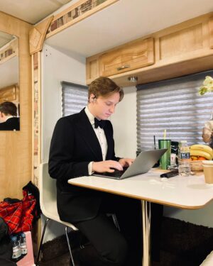 George Ezra Instagram - Suited and booted and ready to write a journal ✍🏻

Sadly there won’t be a new one tonight as I’m currently sat in this caravan backstage at the Royal Albert Hall (of all places!). But keep your eyes peeled for one dropping into your inbox tomorrow instead ☺️ Hope you all have a lovely evening! G x