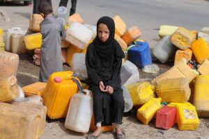 George Soros Instagram - Yemen's ongoing civil war is a humanitarian crisis. Innocent Yemenis suffer as Saudi Arabia and the United Arab Emirates conduct attacks there—with U.S. support—and Iran provides weapons for rebel forces. Indiscriminate airstrikes and rocket launches, use of banned cluster munitions and landmines, and the arbitrary detention, torture and disappearance of many have exacerbated an already dire situation. Now is the time for both regional and global leaders to rise to the occasion, end the bloodshed, and bring all those who've violated the Yemeni people's human rights to justice. 
A Yemeni girl waits to receive clean water in Sana’a, Yemen, on July 17, 2018. Photo credit: © Mohammed Hamoud/Getty 
#opensociety #saveyemen #yemencantwait #yemencrisis