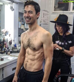 George Young Instagram - #Malignant Stories: I got cut for this movie! (Literally at one point: on some sugar glass making contact with my baby soft skin, but that's for another post):

One of my my first chats with @creepypuppet after I got the role was him asking me to bulk up for the character. I had about 2 months (and I'd been enjoying a LOT of Singaporean chicken rice and Malaysian laksa in the prior months). So I hit that gym and...not sure I bulked up, but I lost the love handles (there's @eleanormakeup making sure my t-shirt tan lines aren't showing...)

MALIGNANT OUT SEPT 10TH SEE YOU THERE!