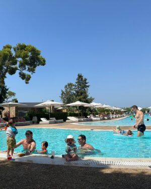 Georgie Barrat Instagram - We’ve just got back from our first all inclusive holiday. I’m not usually an all-inclusive kinda person, so thought I’d share a few things on how we found it. 

✨What I loved 
There was barely any admin. Holidaying with a 1.5 year old can sometimes be a logistical nightmare. Day bags! Snacks! Car seats! Naps! Too hot! Too cold! Change of clothes! Cook! Clean! Honestly we didn’t have any of this as we were always super close to our room, there were food options everywhere & the hotel arranged transfers. We really didn’t lift a finger. 

Kids club! All the kids went everyday from 3 - 6pm (hence the afternoon cocktail drinking 😋) giving us a little reminder of what it was like holidaying pre-baby. WARNING: we did have tears on one of the days at drop off, but it helped that she was in there with the other 4 babies we were away with. 

The staff! They went above & beyond to make us feel welcome. I don’t know what kind of training goes on at @ikosresorts but every single person was outstanding and never once did we feel like we had to apologise for our unruly rabble or odd requests. 

✨What I missed
For me I love the adventure of a holiday - exploring new places, finding hidden gems, doing multiple activities. This obviously features a lot less when you’re in a resort. The hotel did arrange for us to have a car for the day, but by the end of the week I was ready for a change of scene. This is very much a personality trait in me though - I always like having lots of variety in my day. 

Restaurant choices. The food and drink were excellent and we had 5 restaurants to choose from, however only 2 did breakfast and lunch and they both had similar setups. Again, just because I like loads of variety, by the end of the week I was ready for a change. We had 2 brilliant dinners outside of the resort and the hotel were great at arranging babysitters & taxis for us. 

All in all we had a wonderful holiday. If you have small children and are looking for a break then I thoroughly recommend. It’s not something I would have done before having a kid, but it was perfect for our family 🙌