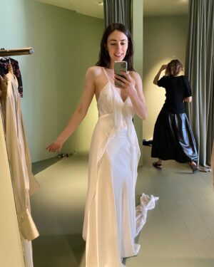 Geraldine Hakewill Instagram - When Mark and I surprised our family and got married over Christmas I was very lucky to have my 11th hour dress made for me by my friend @biancaspender 🌸 It was like a second skin and it helped me feel effortlessly glam and special. She is releasing a new bridal collection soon and you could wear your very own creation down the aisle/forest path/jetty… I can highly recommend.
Mark had his linen suit custom made by the amazing @annacordell_ and we both wore our @rmwilliams boots. Our local flower farm made my bouquet @fleurs_de_lyonville and a beautiful neighbour and now friend @clairderwortphotography took our photos. Another friend @i_am_jika made our rings from recycled gold. 
I did my own hair and make up which the wind and my tears quickly made short work of. I got sunburnt shoulders and felt giddy and couldn’t stop smiling all day.