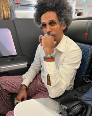 Gigi Levangie Instagram - The man dresses to fly, what can I say. Delta wasn’t ready for the sheer magnificence, but Paris probably will be. (Also, yes, I am sleeping in my Fendi sunglasses; I’m at the age of eccentricity. 😜😂❤️) Oh, also, also - I bought four books at the airport - I love me a good airport bookstore. 😍😍📚📚