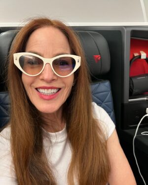 Gigi Levangie Instagram - The man dresses to fly, what can I say. Delta wasn’t ready for the sheer magnificence, but Paris probably will be. (Also, yes, I am sleeping in my Fendi sunglasses; I’m at the age of eccentricity. 😜😂❤️) Oh, also, also - I bought four books at the airport - I love me a good airport bookstore. 😍😍📚📚