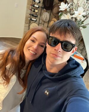 Gigi Levangie Instagram - Young man wants to take a pic with his mom? Jump on that! What you see here on the left is “rewrite face” - if you see me wandering around the neighborhood, muttering to myself, just pat my hand and gently walk me home. What you see on the right is not a young Tom Cruise but a big ol’ piece of my heart. ❤️🤯😂🙏🏼❤️