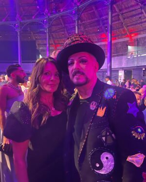 Ginny Buckley Instagram - About last night… giving it some ‘attitude’ for a special night out. A huge thank you to @peugeotukpr @peugeotuk and @attitudemag for the most uplifting, joyful and thought provoking evening at the #attitudeawards 🤩

I had a lovely chat with @boygeorgeofficial who was kind and funny and just as glorious as I thought he would be when the teenage me had his poster on my wall! ❤️

It was incredible to see the joy, warmth and support that exists within the LGBQT  community - not to mention the glamour! - and I’ll always be an ally and supporter 🏳️‍🌈

You know how to organise an ‘alluring’ night out @masonf55 😉 

👑 Jewellery from @sorujewellery 
💃 Dress @thevampireswife rented from @hurr @kelsrentalwardrobe 
💋Glam by the fabulous @hmu_atelier 
👠Shoes bought from @vinted 

#attitudeawards #peugeot #redcarpet #redcarpetfashion #vampireswife #ootd #littleblackdress #sorujewellery