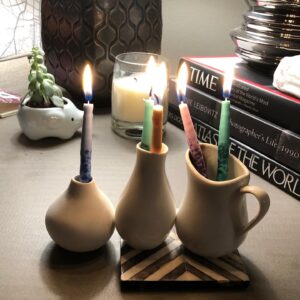 Giselle Eisenberg Instagram - What do you do for Hanukkah when you have to work away from home and don’t have a menorah? Make it work with what you have!! #HappyHanukkah #GettingCreative #FourthNight