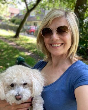 Glynis Barber Instagram - Enjoying some rays with my pooch. 
#summer #walkies #puppylove