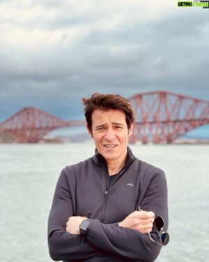 Goran Visnjic Instagram - Chasing World heritage sights...😎... #forthrailbridge is one on the photo behind me, just short drive from #edinburgh which is of course also World heritage sight, the whole city that is...😊... Grateful to be able to travel and explore this beautiful country....😊🙏🏻... #scotland #uk