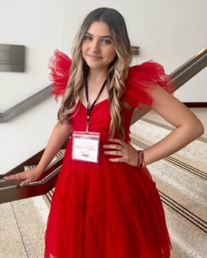 Gracie Whitton Instagram - Day 2! 
Crowning Day for Miss Teen Dallas is here and I am loving the day in red! ❤️❤️❤️❤️❤️❤️❤️❤️❤️❤️❤️❤️
* 👗 @sassypantzfortworth 
* Bracelets: @kendrascott #americanlegacyproducts
* Hair: @hannah_mckeon.22 
* Products: @hairitagebymindy 
* Earrings: #americanlegacyproducts

Thank you to my roomie, Hannah,for coming with me! Keeping me looking on point! 

  Sic Em’ Bears! 💚🐻💛
