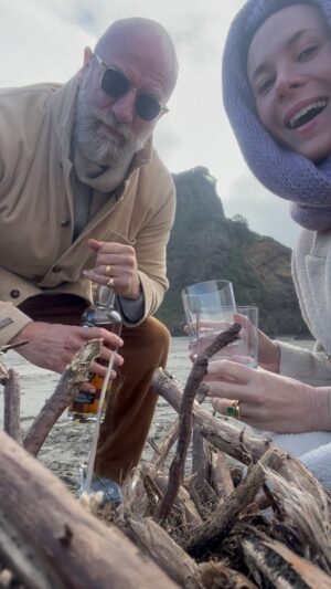 Graham McTavish Instagram - Whiskey road test number 5? A wild beach in New Zealand provided the perfect backdrop to this essential test. Salty air, wind, crouching while sipping. How would these factors affect the flavour??? @garancedore @mctavishspirits #nzbeachlife #boozeonthebeach #driftwoodtripod