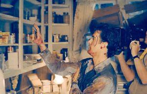 Greg Nicotero Instagram - So I downloaded a negative scanning app and started digging into my old stacks of negatives.  #evildead2 with @hoops511 touching up @shemp_malone evil hand under the supervision of the brilliant #samraimi  MORE TO COME #makeupfx